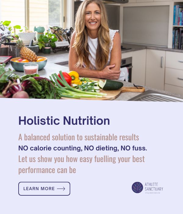 Image of Kate Smyth, in her kitchen. She's a sports Naturopath for female athletes. Image text says: Holistic nutrition: a balanced solution to sustainable results. NO calorie counting, NO dieting, NO fuss. Let us show you how easy fueling your best performance can be.