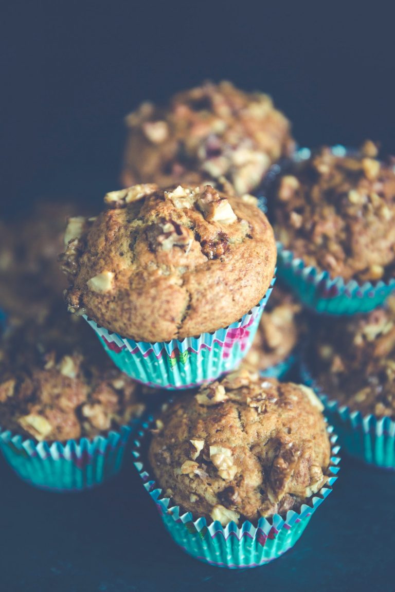 stack of apple spiced muffins in blue cases